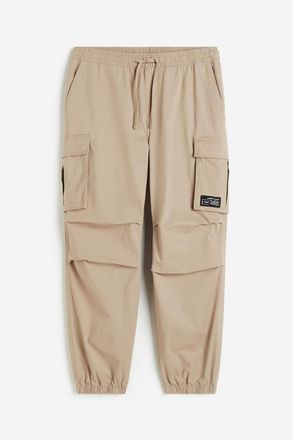 H&M Cargo-Joggpants aus Baumwolle Relaxed Fit - Beige