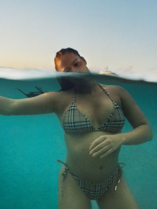 A model wears a two-piece Burberry check-motif bikini.