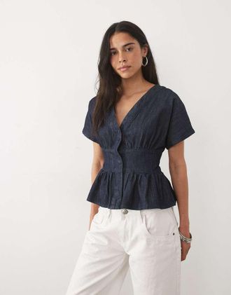 Miss Selfridge top in denim con maniche a pipistrello e nodo sul davanti lavaggio grezzo-Blu