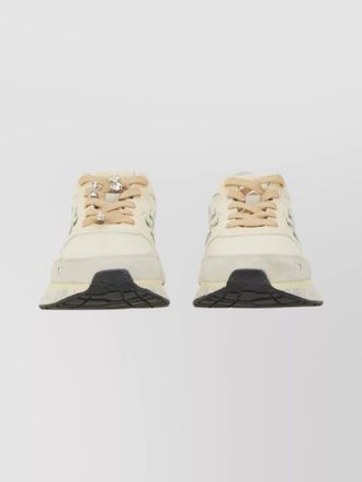 Premiata low-top sneakers featuring textured sole