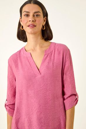 Roman V-Neck Wrap Hem Tunic Top