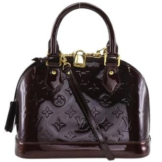 Louis Vuitton Tweedehands leren Louis Vuitton tassen - Dames - Pre-owned - Paars - Maat: ONE Size Leer