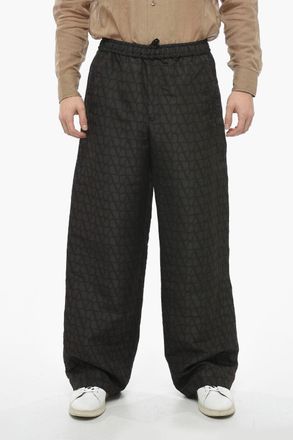 Valentino Joggers in Seta con Fantasia Logo All Over Valentino