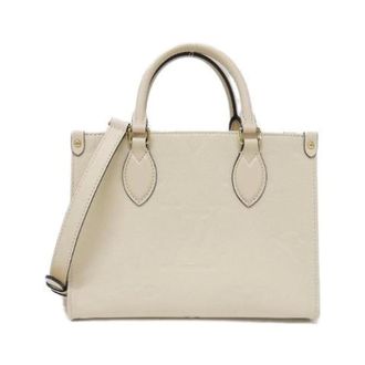 Louis Vuitton Pre-owned OnTheGo Monogram Empreinte Leder Tas - Dames - Pre-owned - Beige - Maat: ONE Size Leer