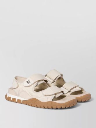 Miu Miu tyre technical fabric and suede slides