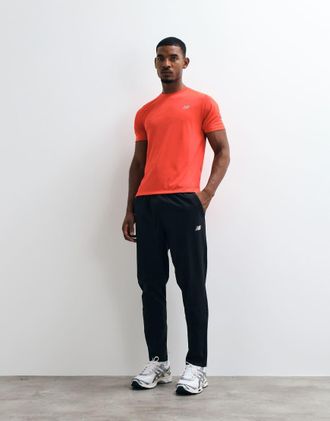New Balance pantaloni utility in tessuto elasticizzato neri-Nero