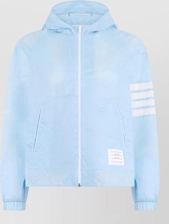 Thom Browne hooded ripstop jacket featuring graphic sleeve