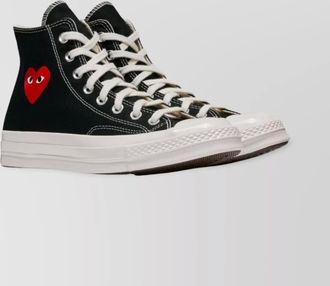Comme Des Garçons low top canvas sneakers with heart motif