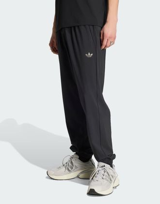 adidas Originals Tech Trefoil Essentials - Pantaloni sportivi neri-Nero