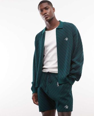 Alma de Ace Rezio - Giacca in maglia verde scuro con colletto in coordinato