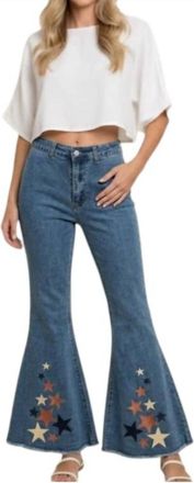 Peach Love California Star Print Bell Bottom Jeans In Blue