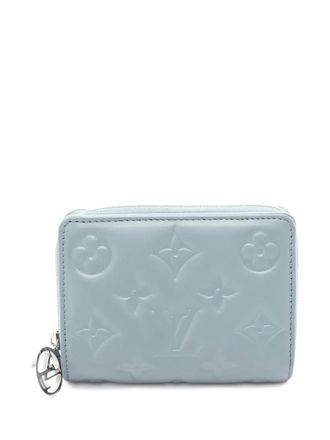 Louis Vuitton embossed-monogram zip bi-fold wallet - women - Calf Leather - One Size - Blue