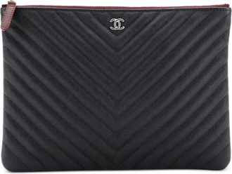 Chanel O Case Chevron Caviar medium clutch - Zwart