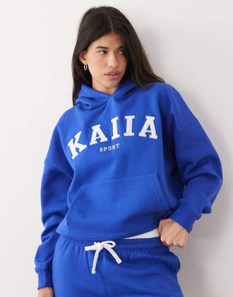 KAIIA Felpa con cappuccio oversize in misto cotone blu cobalto con logo ricamato in coordinato