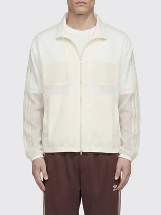 adidas Originals Giacca a vento in nylon riciclato con collo alto e zip