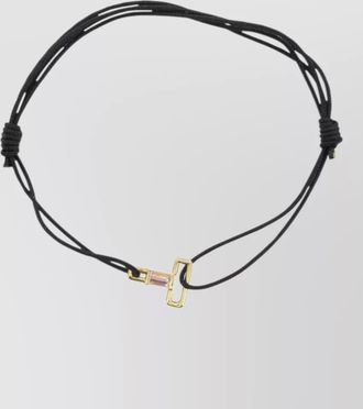 Aliita bracelet featuring letter t and charm