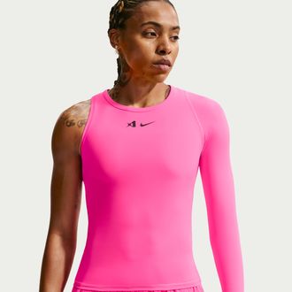 Nike Womens Aja Wilson Asymmetric Reversible Dri-FIT Basketball Top in Pink | II4238-645