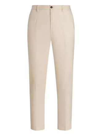 Dolce & Gabbana pressed-crease trousers - men - Spandex/Elastane/Cotton - 52 - Neutrals