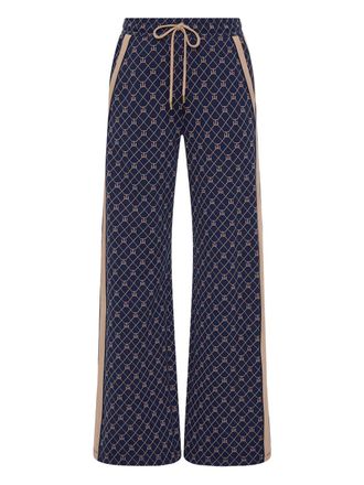 The Upside EZRA patterned flared trousers - Blue