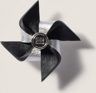 Miu Miu Leather pinwheel brooch