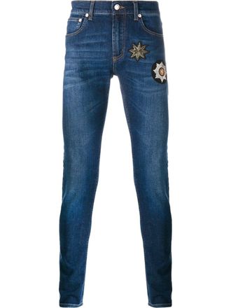 Alexander McQueen Jeans skinny decorati con toppe - Blu
