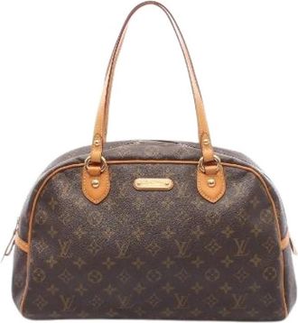 Louis Vuitton Pre-owned Montorgueil GM Monogram Gecoat Canvas Schoudertas - Dames - Vintage Handtas - Bruin - ONE Size - Leer - Vintage