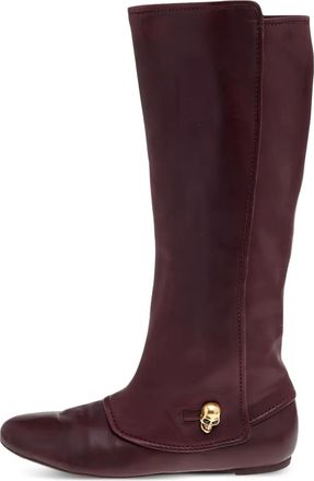 Alexander McQueen skull-embellished knee-high boots - women - Calf Leather/Calf Leather/Rubber - 40 - Brown