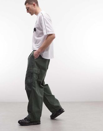Carhartt Work in Progress Cole pantaloni cargo relaxed fit color khaki-Verde