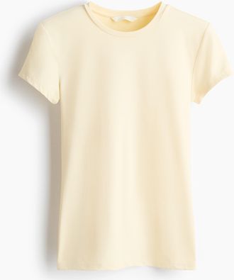H&M Figurnahes T-Shirt aus Mikrofaser - Blassgelb