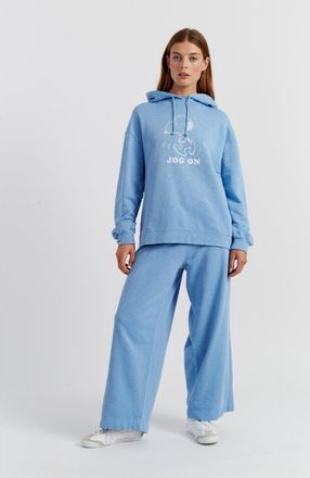 Chinti and Parker Snoopy Graphic Jog On Cotton Hoodie in Sky Blue at Nordstrom, Size X-Small