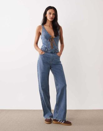 Abercrombie & Fitch Tuta jumpsuit di jeans svasata azzurra con laccetti sul davanti-Blu