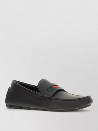 Gucci leather driver loafers rubber sole detailing