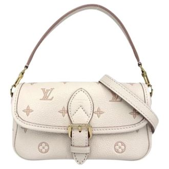 Louis Vuitton Tweedehands Canvas Louis Vuitton tassen - Dames - Pre-owned - Beige - Maat: ONE Size