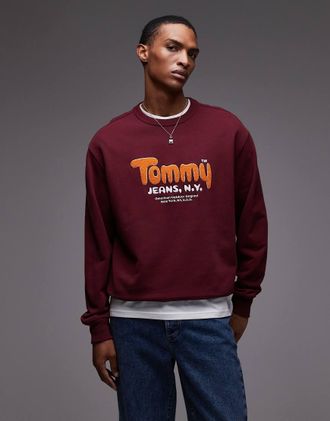 Tommy Jeans Felpa in boucl&eacute; bordeaux con logo arancione