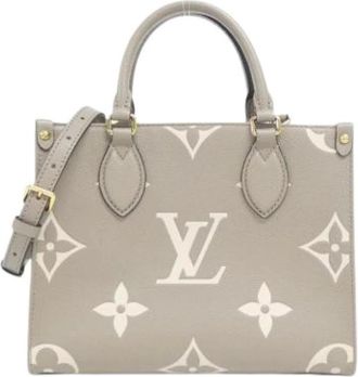 Louis Vuitton Pre-owned Monogram Empreinte Tote - Dames - Pre-owned - Beige - Maat: ONE Size Leer