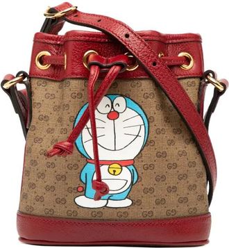 Gucci 2016-2025 Micro GG Supreme Doraemon bucket bag - Brown