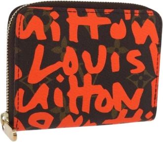 Louis Vuitton Pre-owned Wallets, female, Orange, Size: ONE SIZE Pre-owned Canvas Wallet