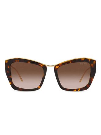 Miu Miu Eyewear Zonnebril met cat-eye montuur en schildpadschild design - Bruin