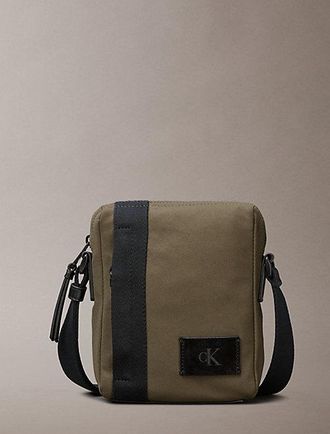 Calvin Klein Canvas reportertas