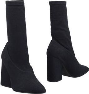 Yeezy by Kanye West CALZADO - Botines de caña alta en YOOX.COM