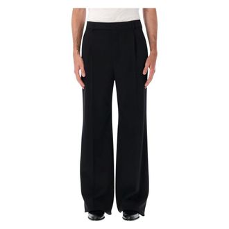 Saint Laurent Pantalones fluidos de sastre en lana certificada - Trousers - Hombre - Negro - L