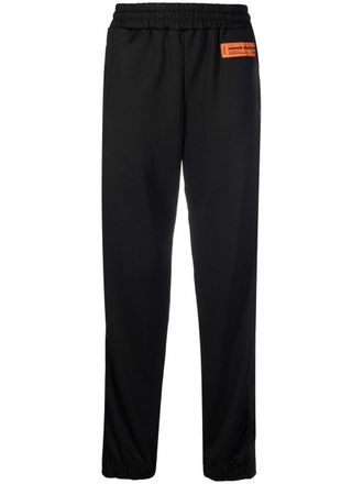 Heron Preston logo patch track trousers - men - Cotton/Polyester - L - Black