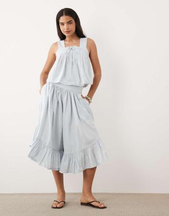 Asos Pantaloni cropped a fondo ampio blu con finiture alluncinetto