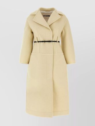 Jil Sander tailored coat with belted waist and structured shoulders