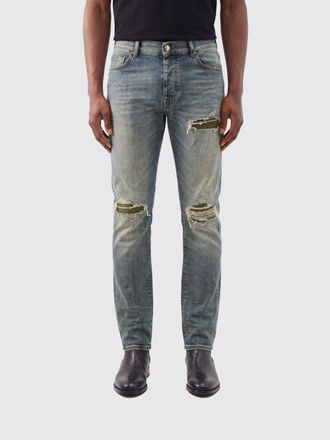 Amiri Jeans straight fit in denim stretch con effetto usurato