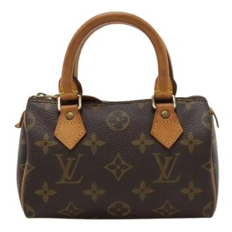 Louis Vuitton Pre-owned Mini Bags, female, Brown, Size: ONE SIZE Pre-owned Mini Pouch