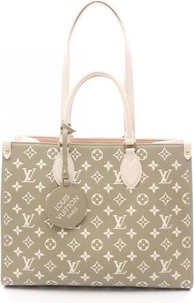 Louis Vuitton 2021-2025 Monogram Empreinte OntheGo MM tote bag - Brown