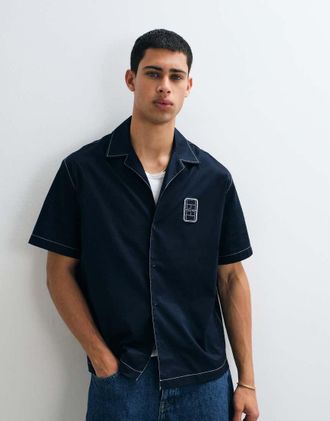 Lacoste Polo a maniche corte blu navy con logo e bottoni