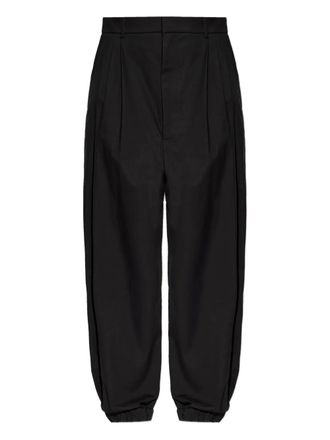 Moschino pleated cuff trousers - men - Cotton - L - Black