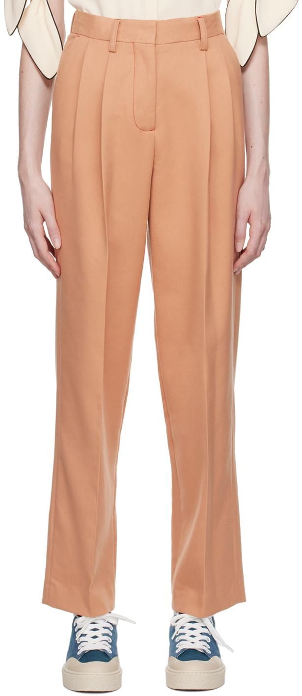 Chloé Flared Checkered Trousers from $1,360.00 - on Stylight